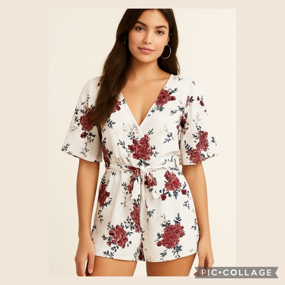 Floral Wrap Shorts Romper with Belt by Charlotte Russe. - Picture 1 of 7